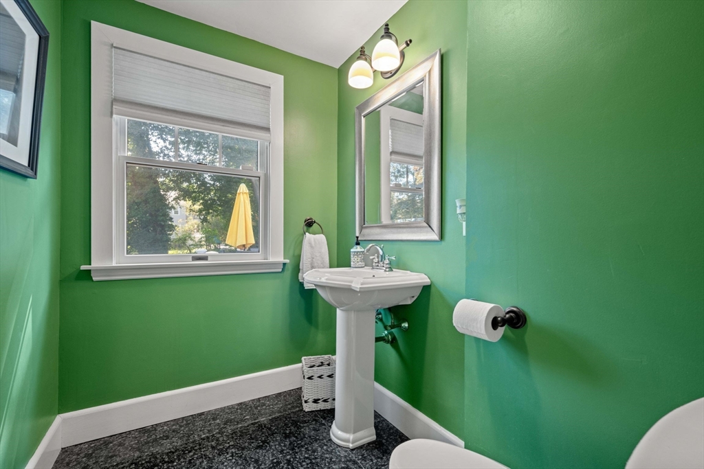 8 Old Salem Road Marblehead, MA 01945 - Photo 18 of 34 a bathroom with a sink mirror and toilet