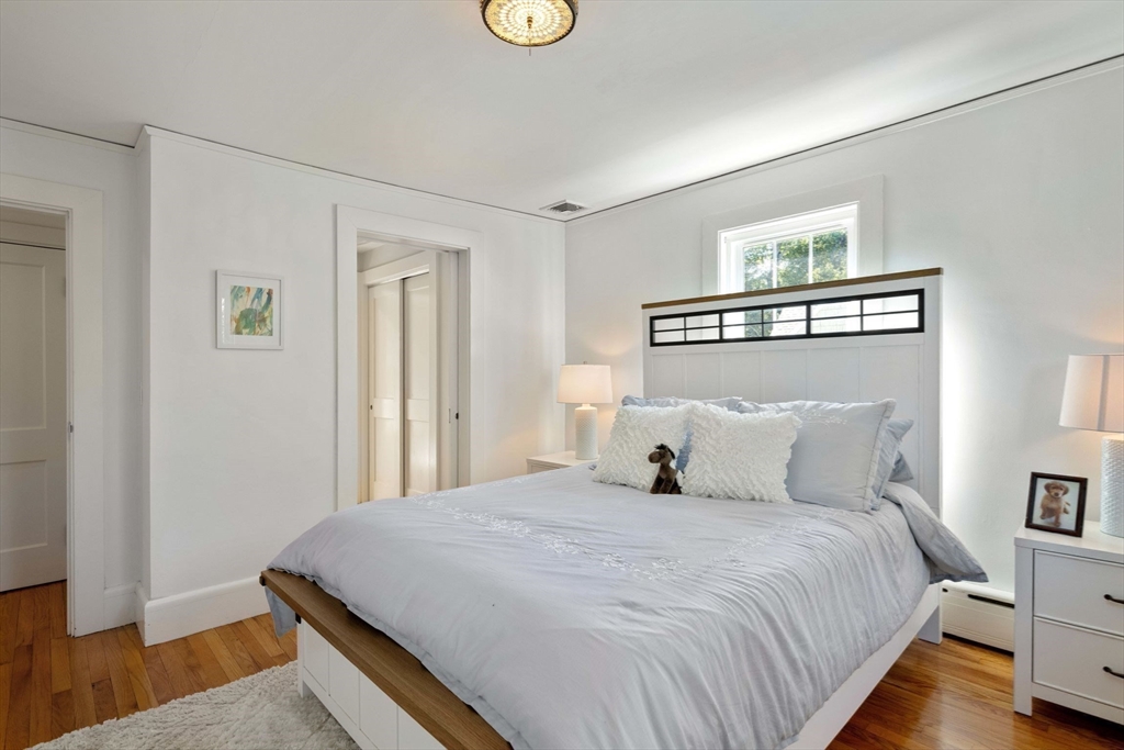 8 Old Salem Road Marblehead, MA 01945 - Photo 20 of 34 a bedroom with a bed and a night stand