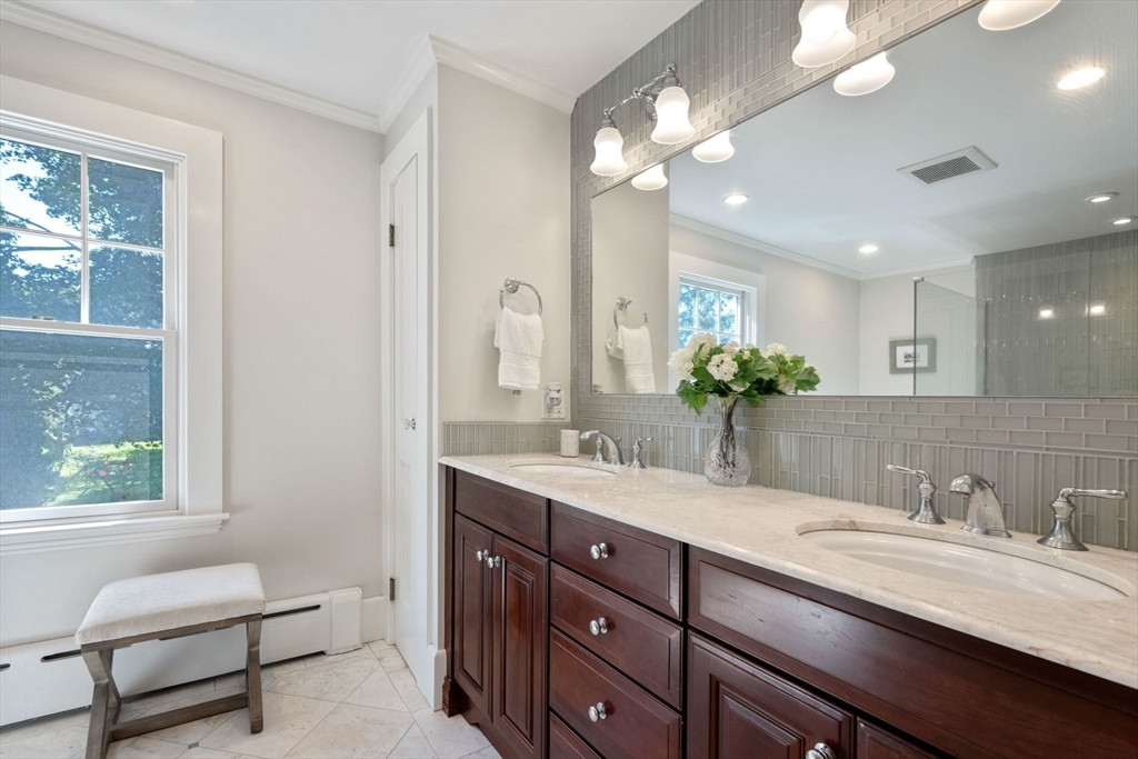 8 Old Salem Road Marblehead, MA 01945 - Photo 23 of 34 a bathroom with a granite countertop sink a toilet and a large mirror