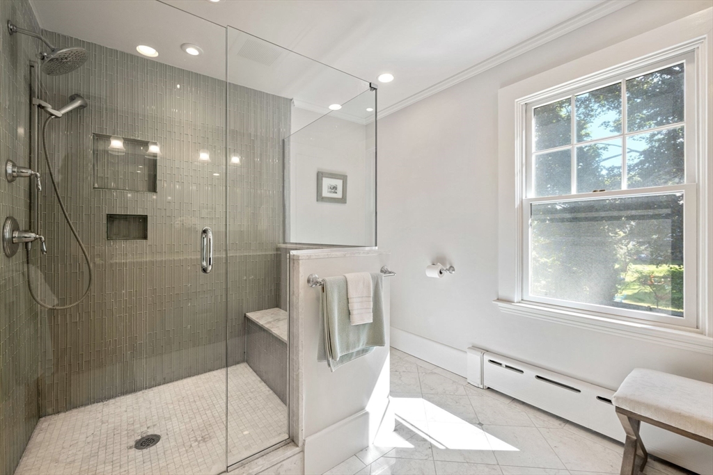 8 Old Salem Road Marblehead, MA 01945 - Photo 24 of 34 a bathroom with a glass shower door and a bathtub