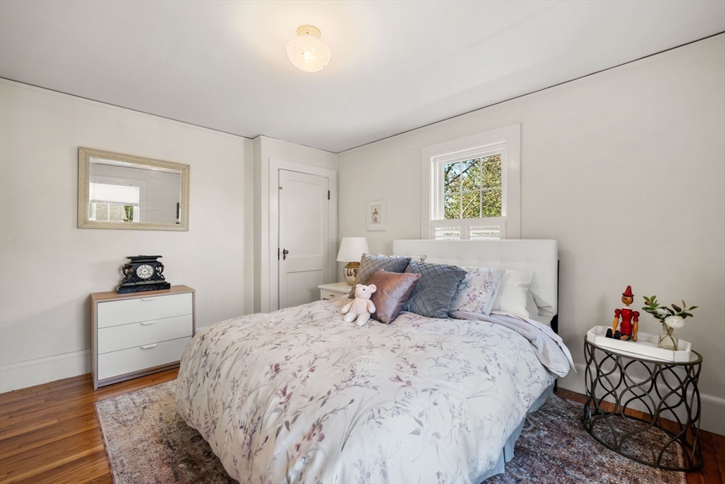 8 Old Salem Road Marblehead, MA 01945 - Photo 26 of 34 a bedroom with a bed and a table