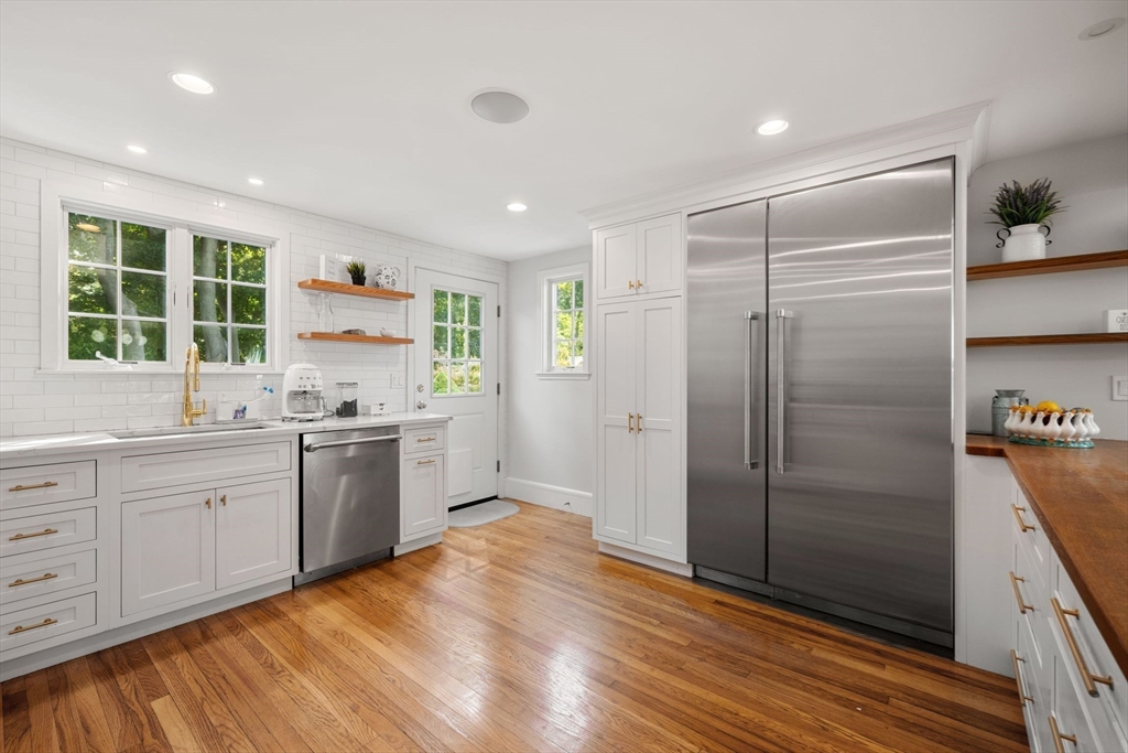 8 Old Salem Road Marblehead, MA 01945 - Photo 7 of 34 a kitchen with granite countertop a refrigerator and a sink