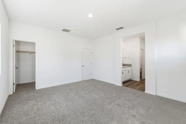 a view of a room with shelf on the wall