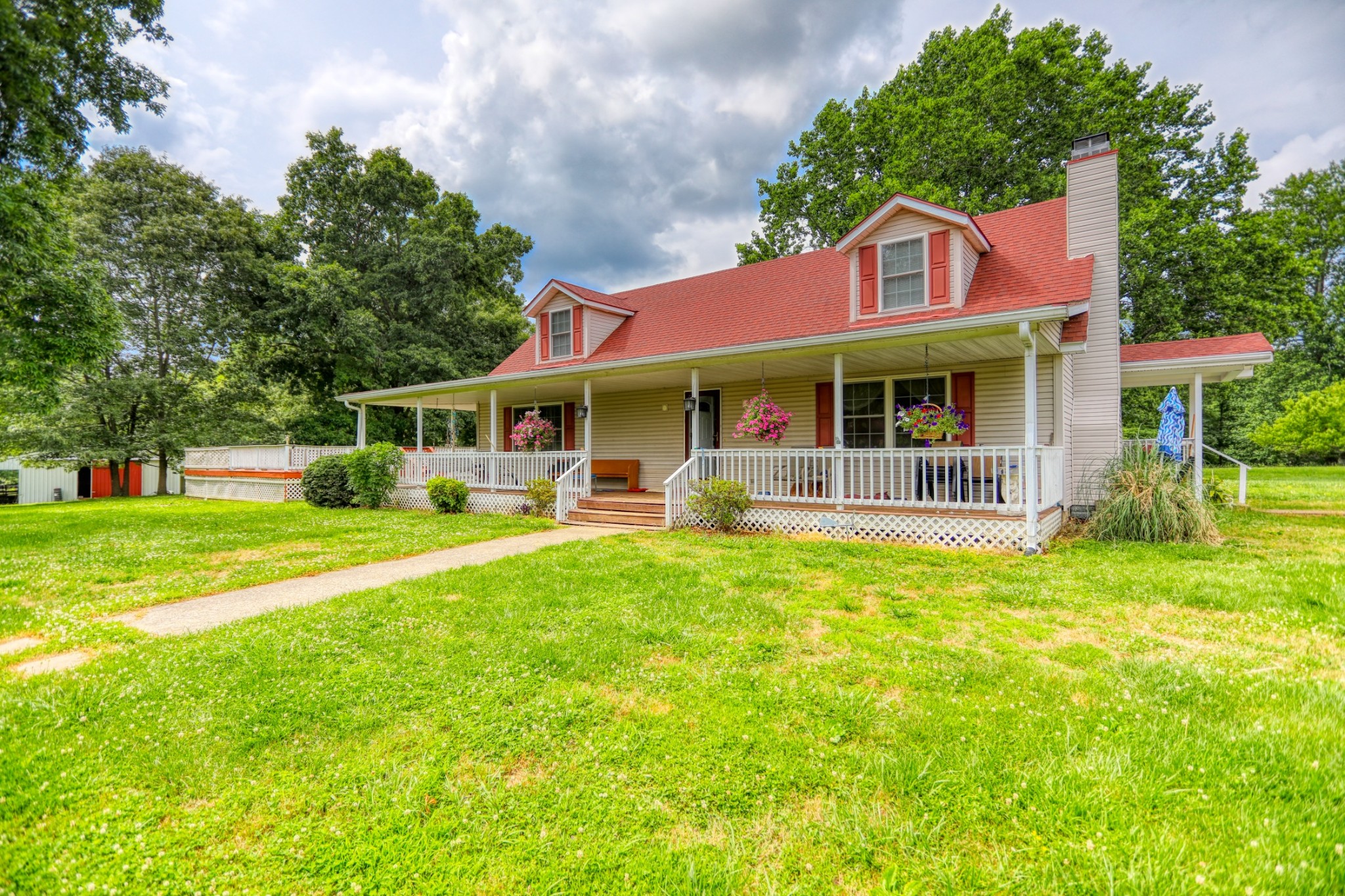 2838 New Roe Road Adolphus, KY 42120 - Photo 1 of 37 a view of a house with a yard patio and a garden