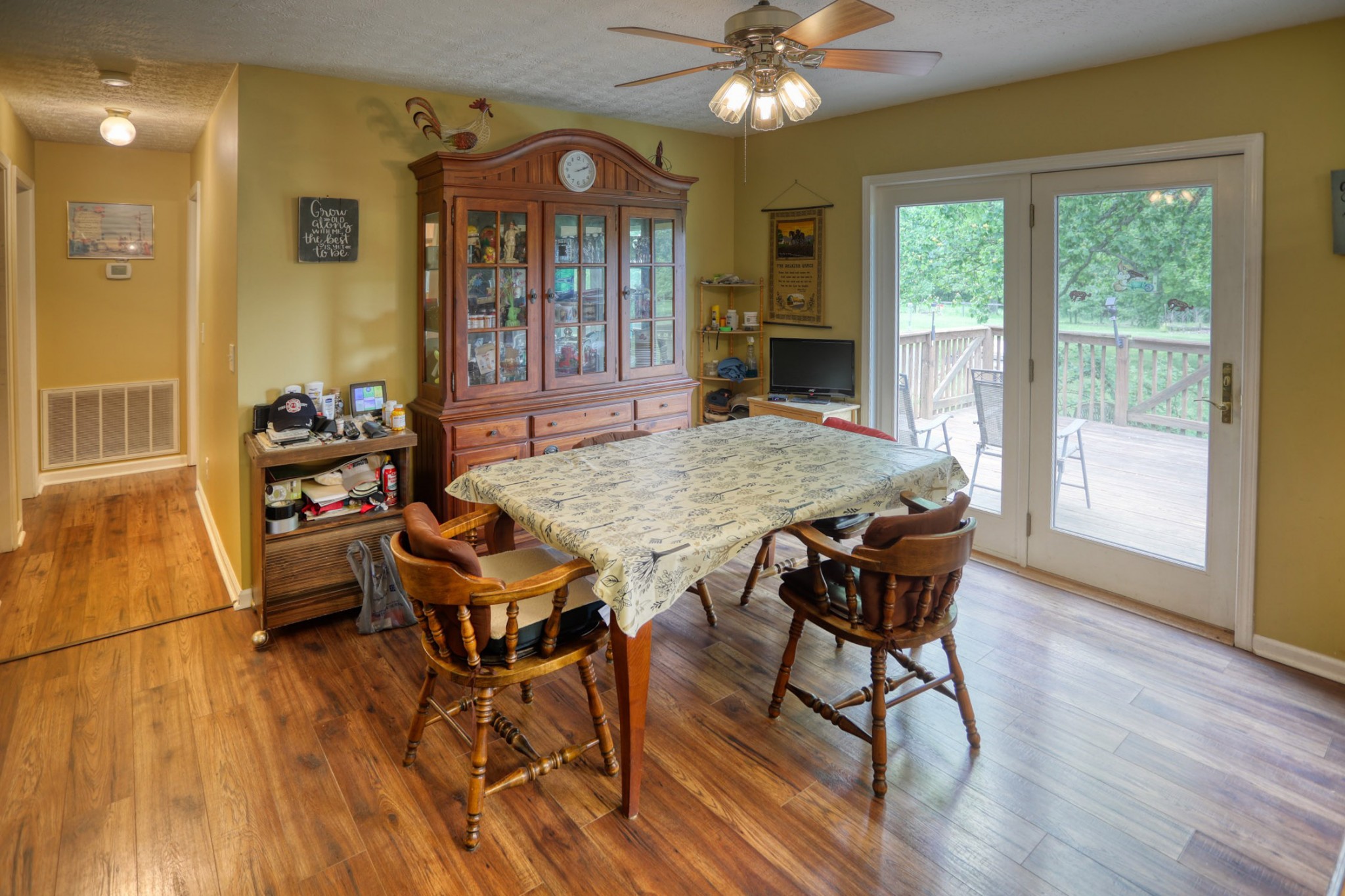 2838 New Roe Road Adolphus, KY 42120 - Photo 15 of 37 a view of a dining room with furniture window and wooden floor
