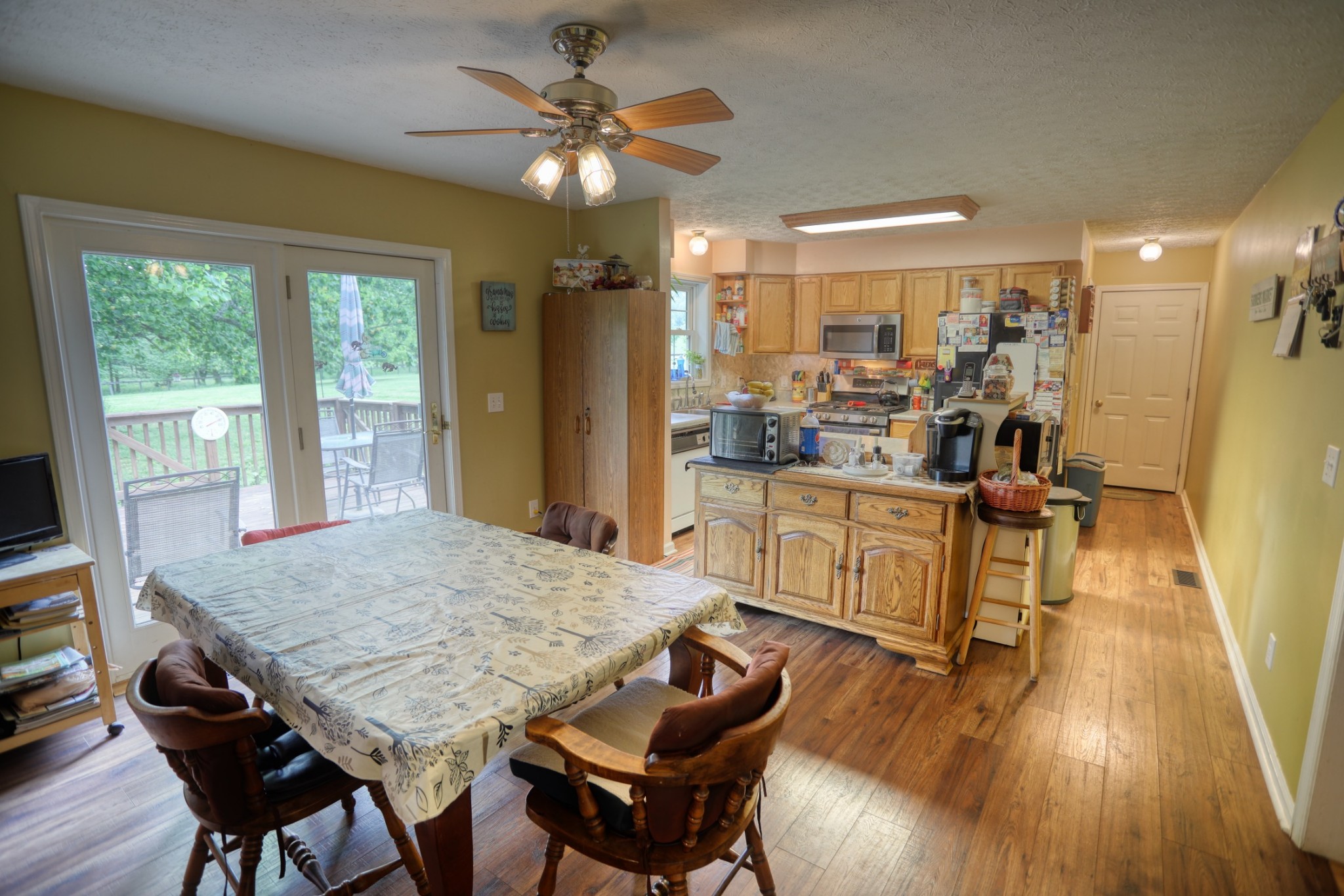 2838 New Roe Road Adolphus, KY 42120 - Photo 17 of 37 a view of a dining room with furniture window and wooden floor