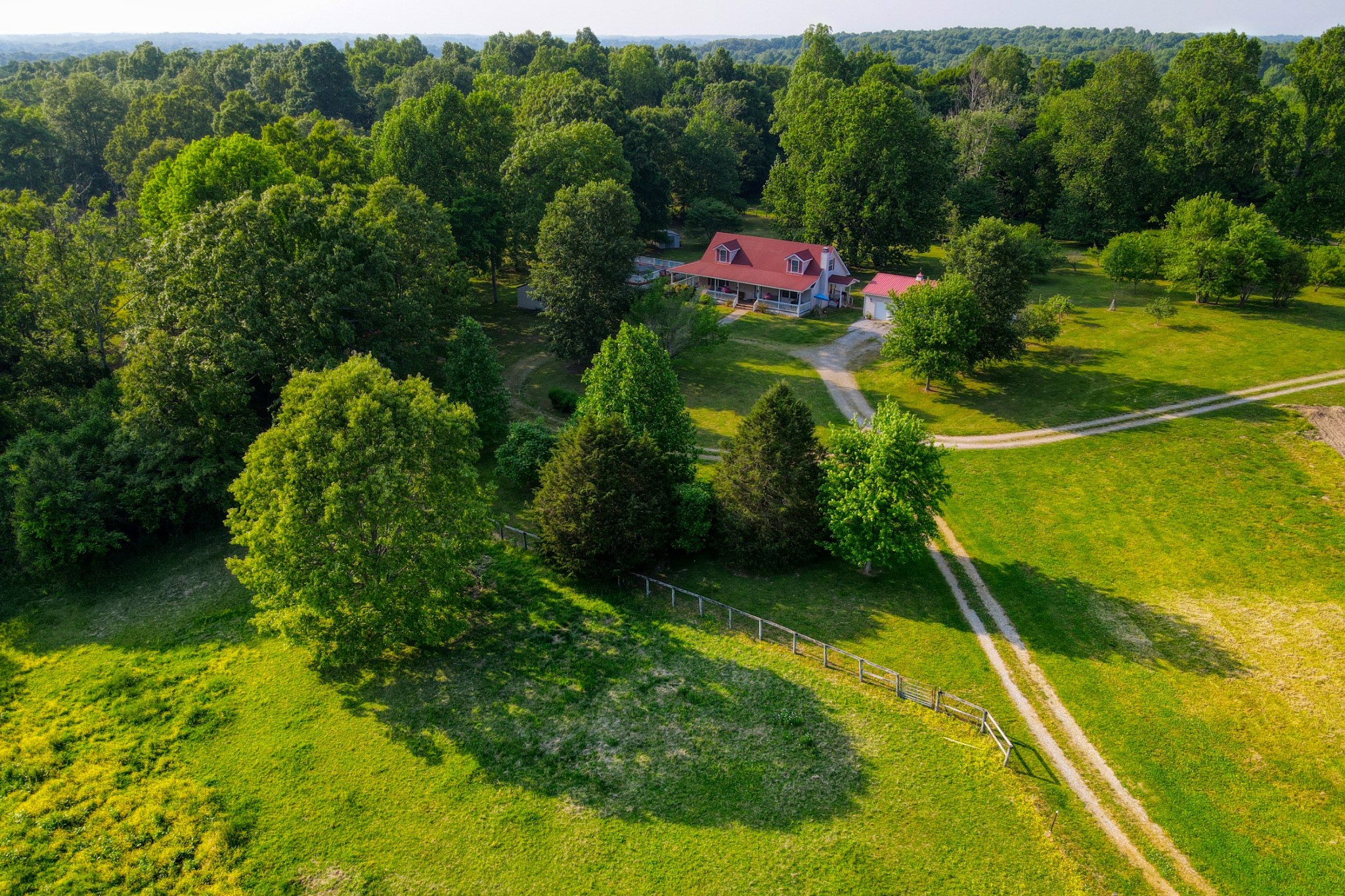 2838 New Roe Road Adolphus, KY 42120 - Photo 21 of 37 a backyard of a house with a yard and lake view