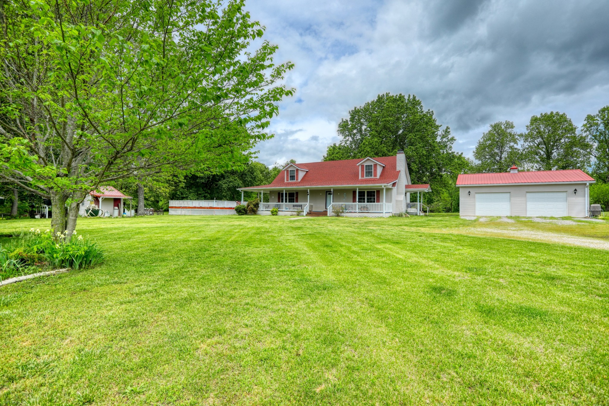 2838 New Roe Road Adolphus, KY 42120 - Photo 35 of 37 a view of a house with a yard