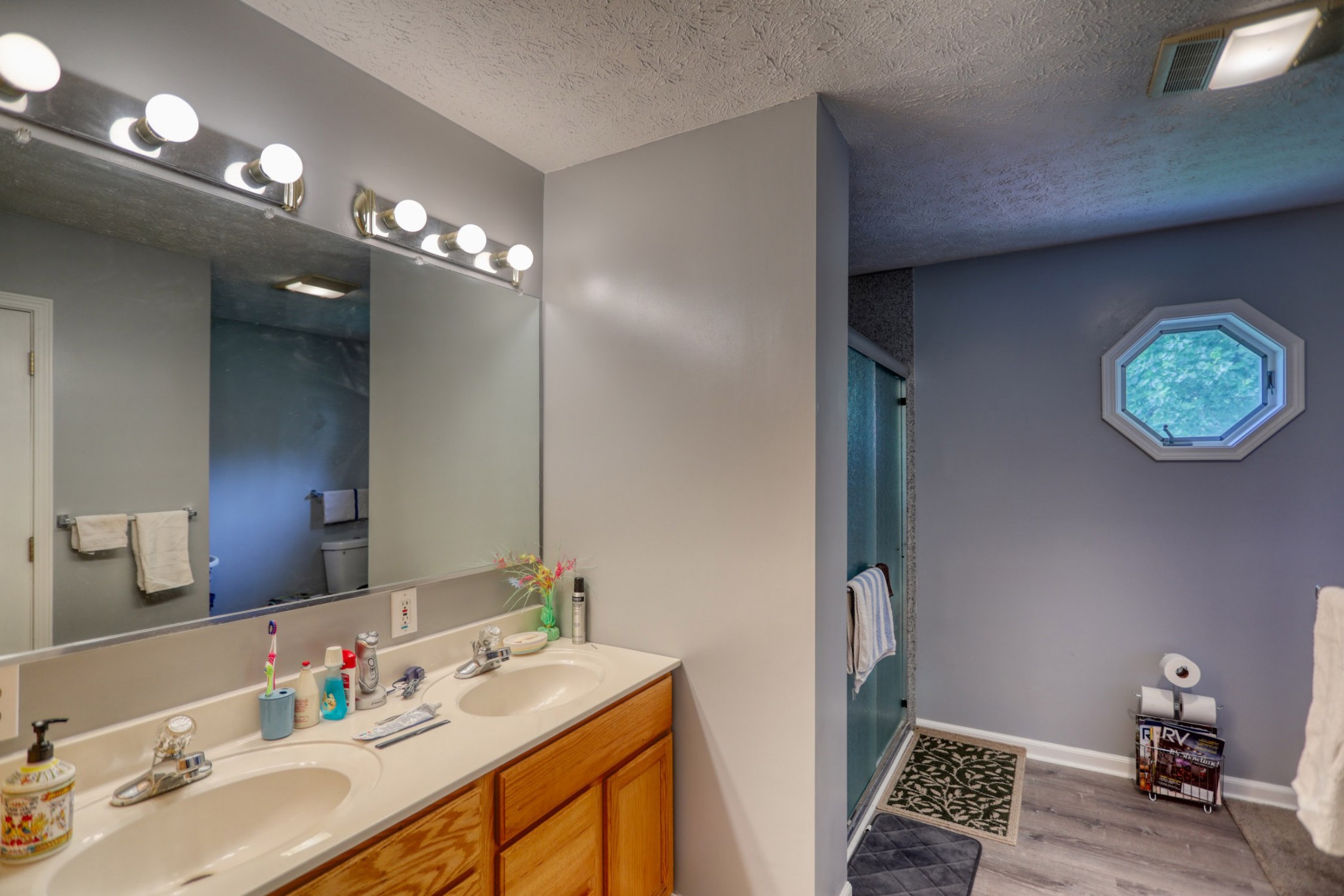 2838 New Roe Road Adolphus, KY 42120 - Photo 6 of 37 a bathroom with a sink double vanity and a mirror