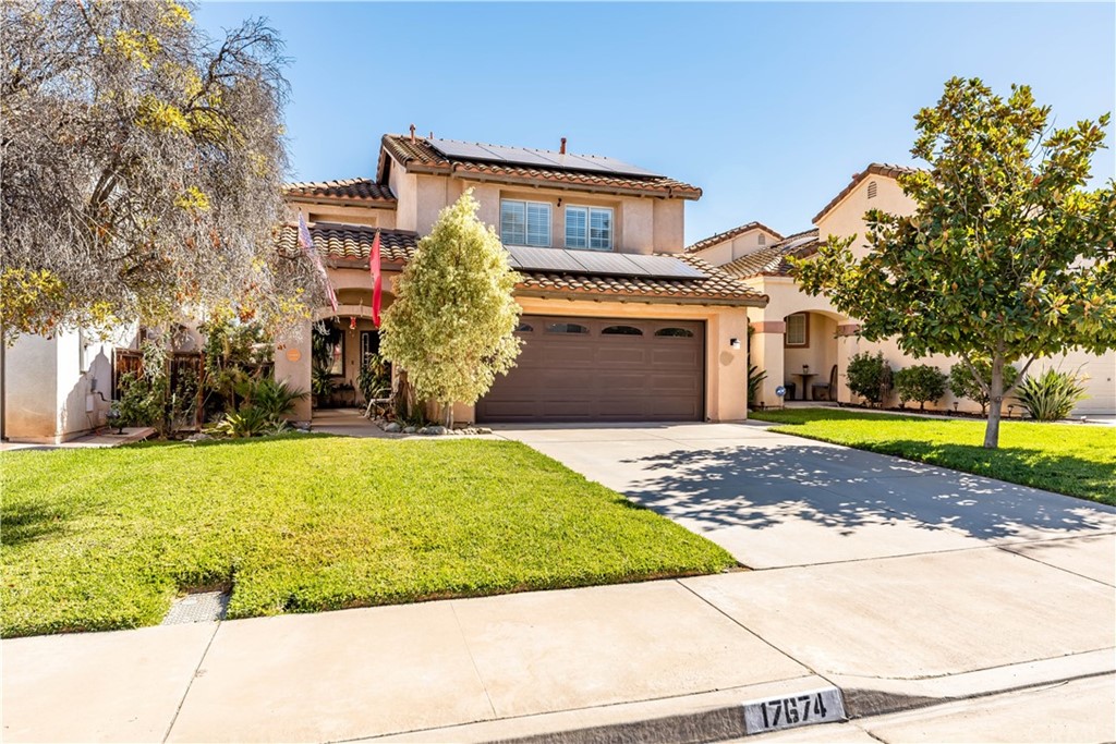 17674 Streamside Lane Riverside, CA 92503 - Photo 1 of 1 a front view of a house with garden