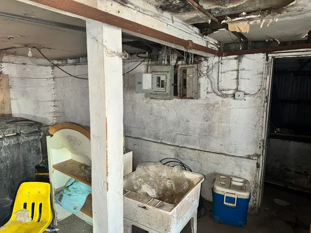 a bathroom with a sink and a shower