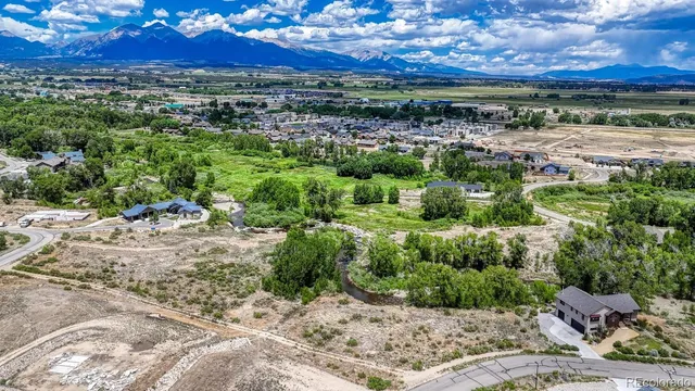 a view of a garden with an outdoor space