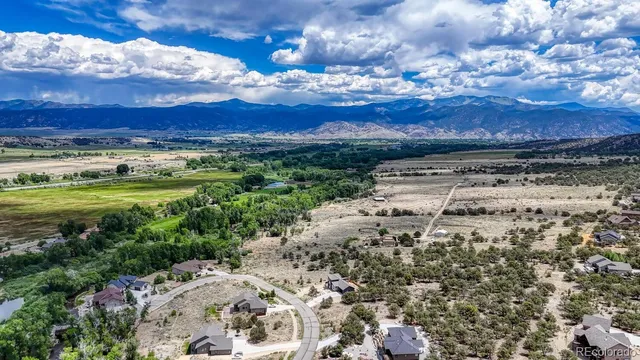 a view of a city with a lake