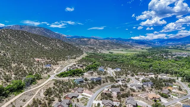 a view of a city with lots of trees