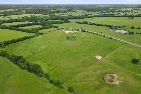 a view of a lush green field