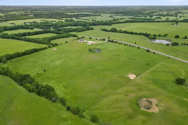 a view of a lush green field
