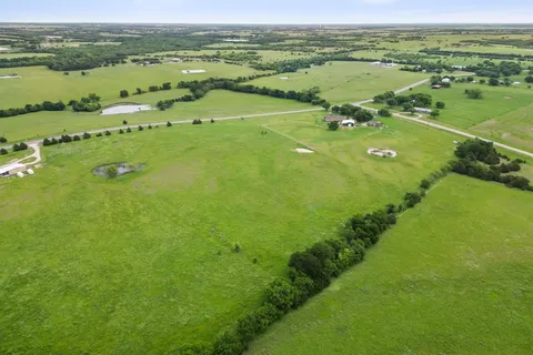a view of a lake with a houses