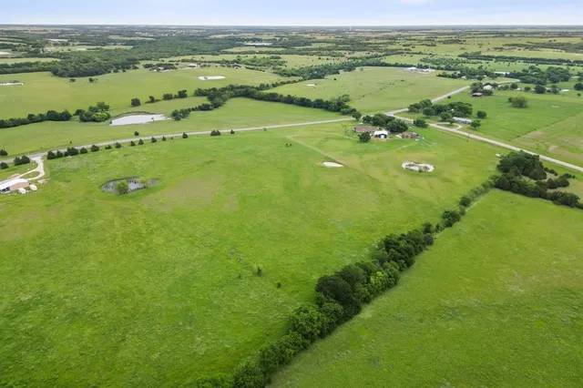 a view of a lake with a houses