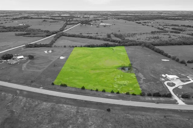 a view of a road with an ocean view