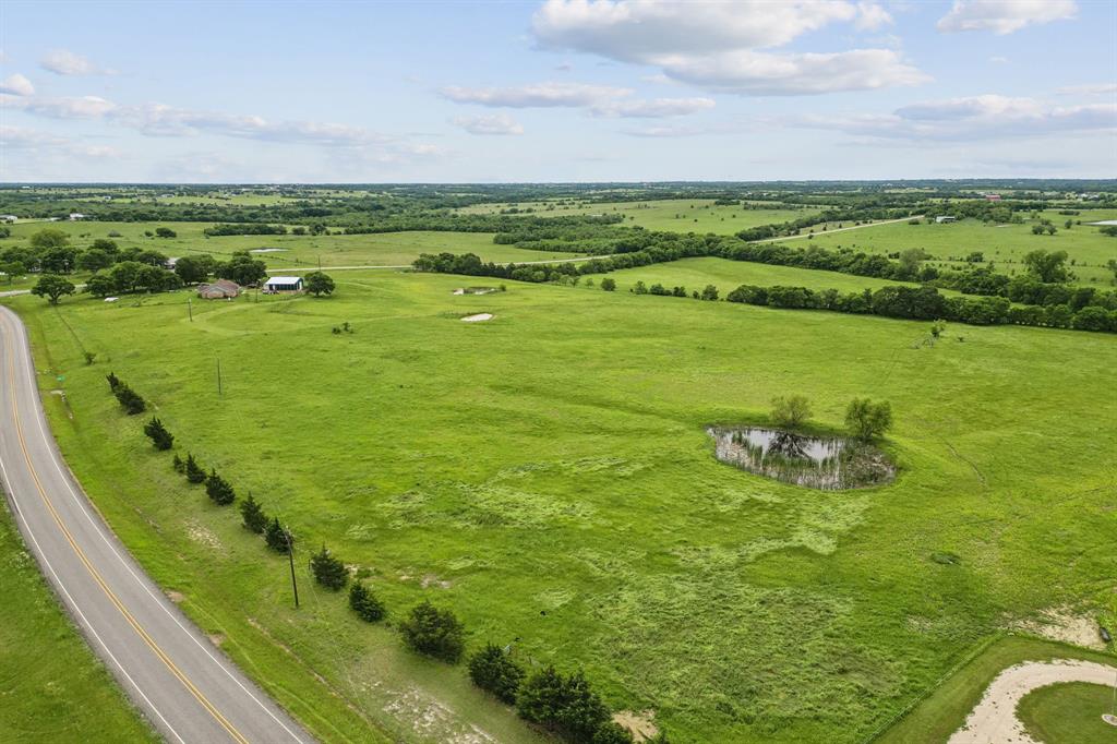1562 Rd Celeste Tx 75423 Road Celeste, TX 75423 - Photo 2 of 21 Overview of rural landscape with agricultural land and a nearby body of water