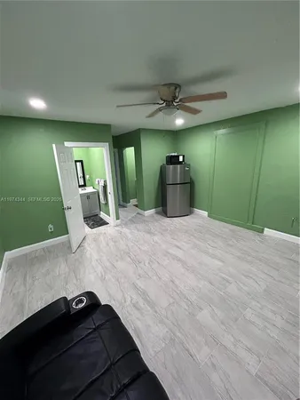 a view of a livingroom with a staircase