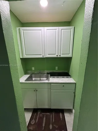 a view of utility room with washer and dryer