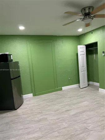 a view of a livingroom with wooden floor