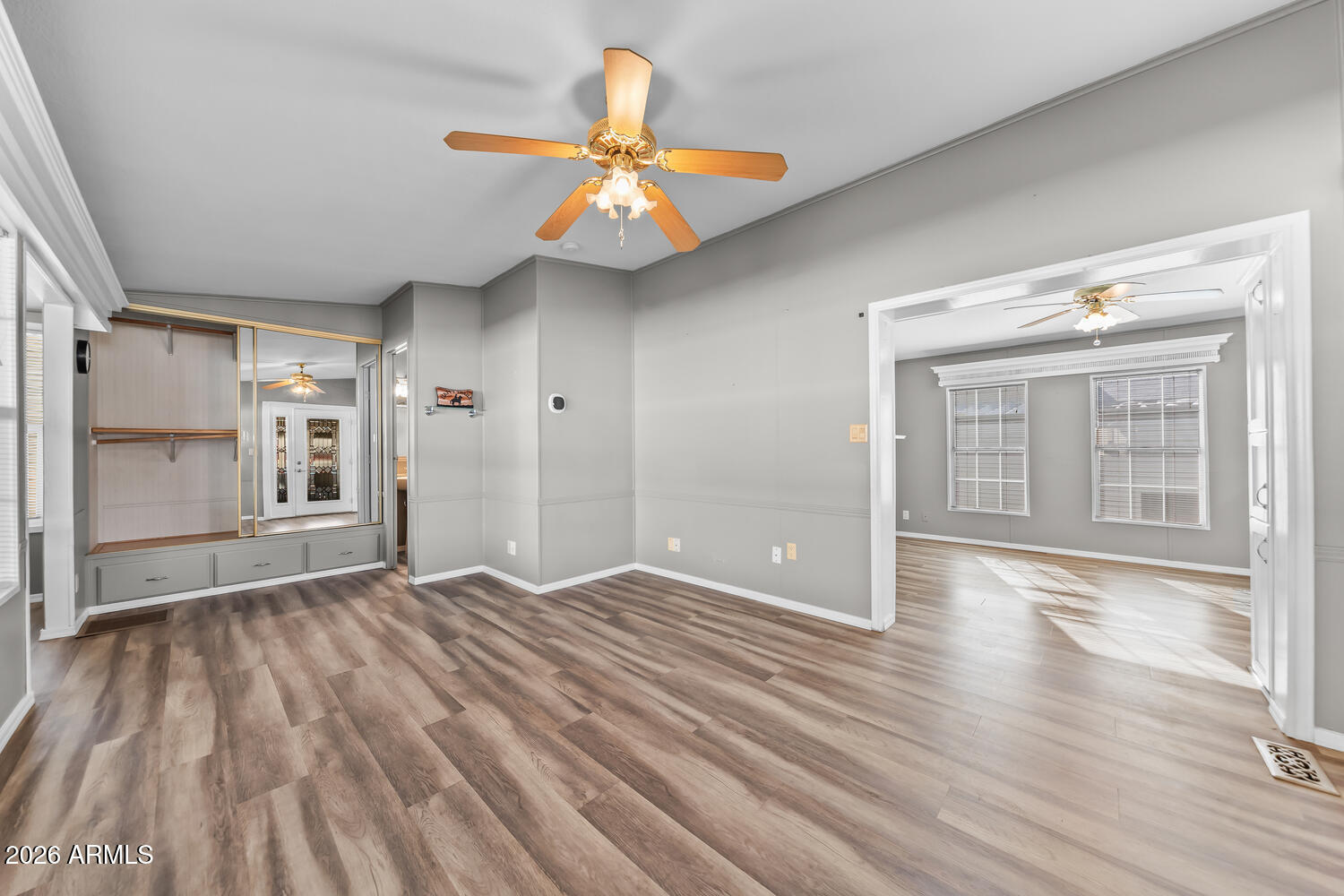 17200 West Bell Road, Unit 390 Surprise, AZ 85374 - Photo 13 of 40 wooden floor in an empty room with a window