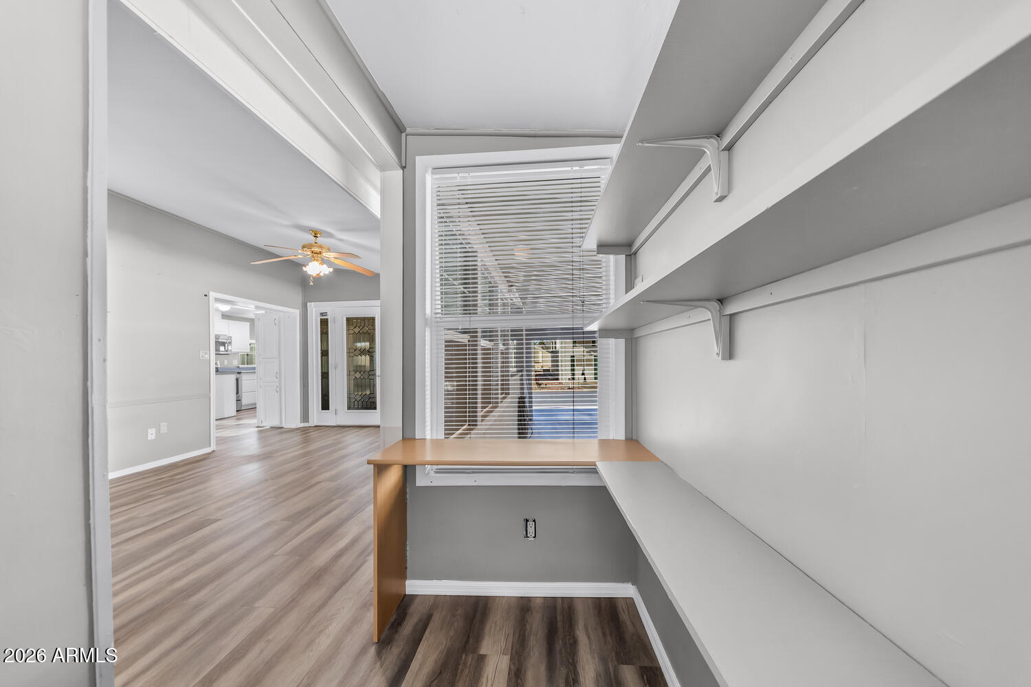 17200 West Bell Road, Unit 390 Surprise, AZ 85374 - Photo 19 of 40 a view of outdoor space with wooden floor and windows