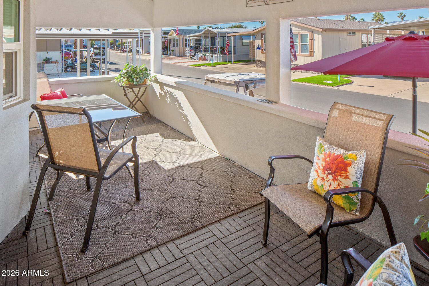 17200 West Bell Road, Unit 390 Surprise, AZ 85374 - Photo 5 of 40 a view of a chairs and table in a patio