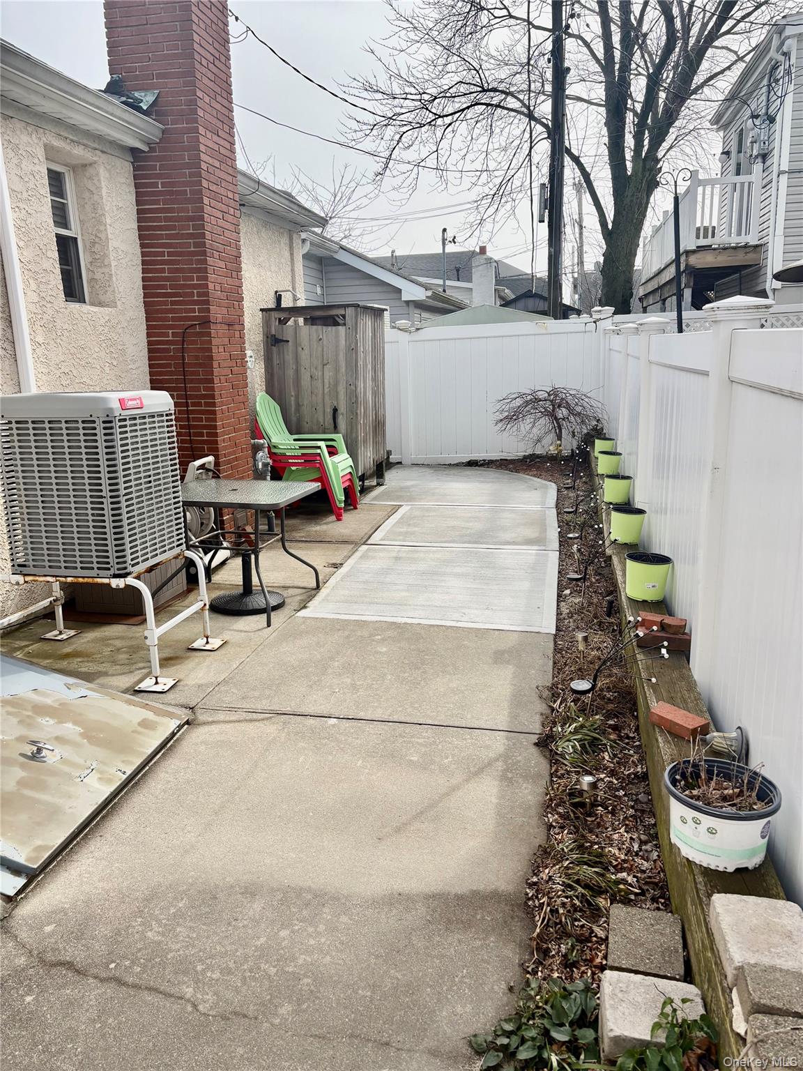 27 June Walk Long Beach, NY 11561 - Photo 3 of 20 a view of a back yard of the house
