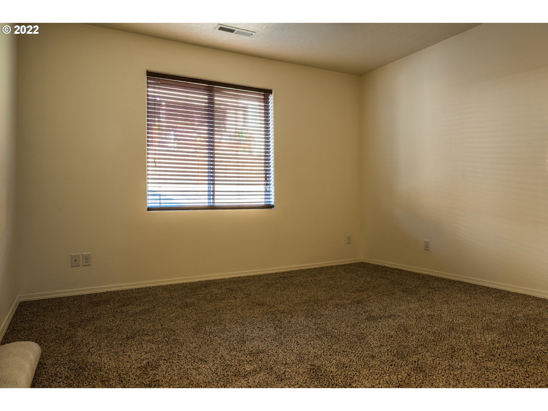 4902 Holly Street Springfield, OR 97478 - Photo 12 of 16 an empty room with a window