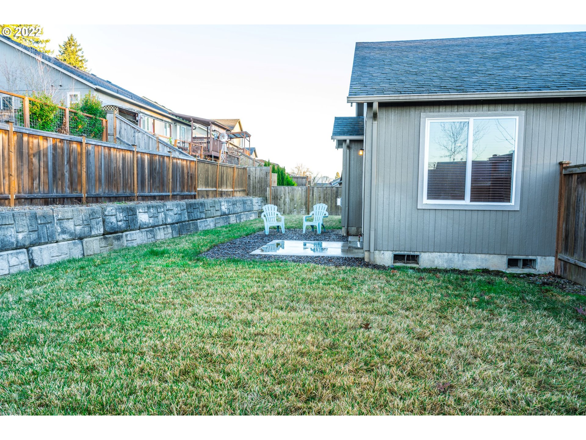 4902 Holly Street Springfield, OR 97478 - Photo 15 of 16 a backyard of a house with lots of green space