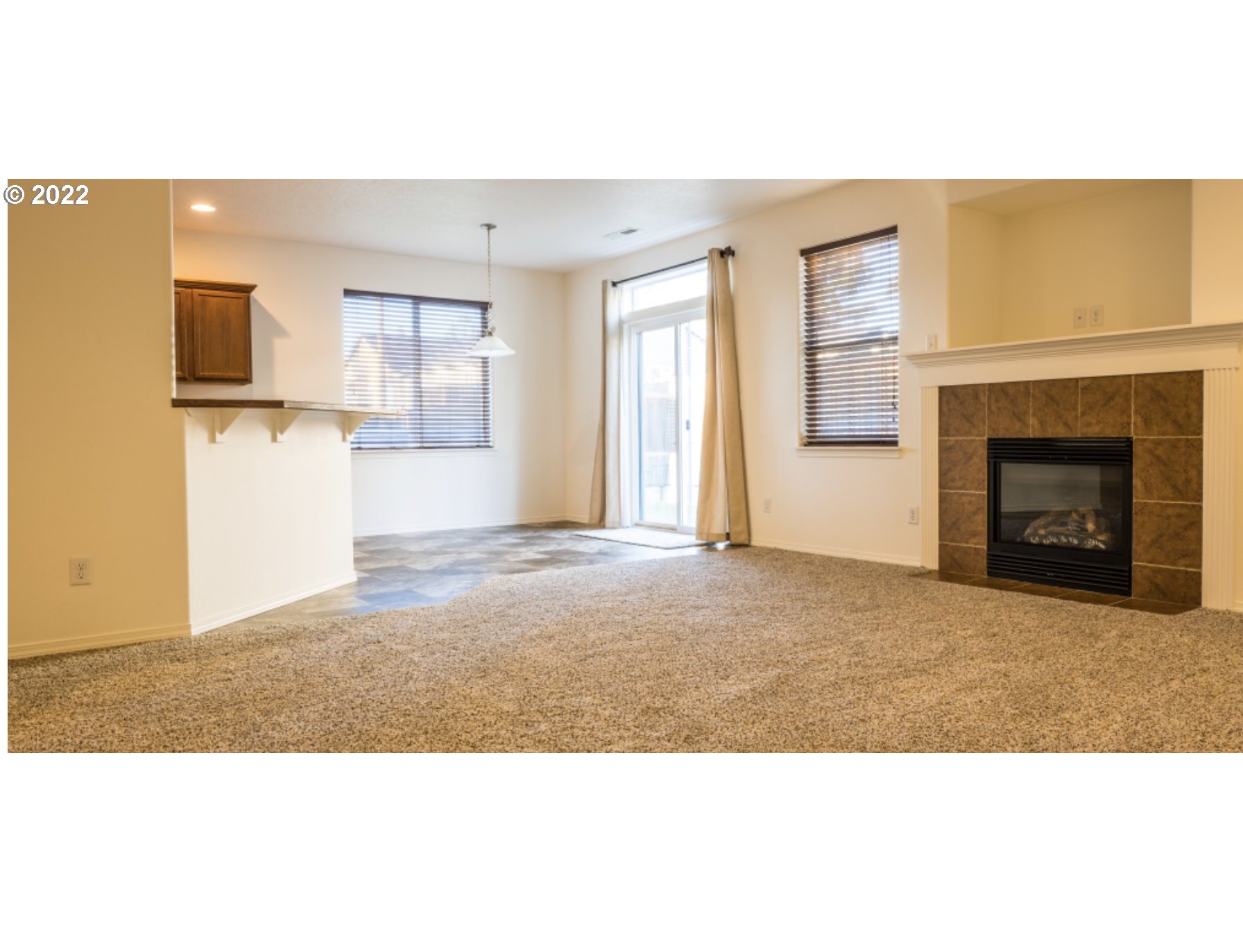 4902 Holly Street Springfield, OR 97478 - Photo 6 of 16 a view of a livingroom with a fireplace