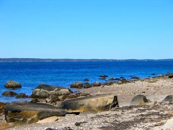a view of a house with swimming pool and sitting area