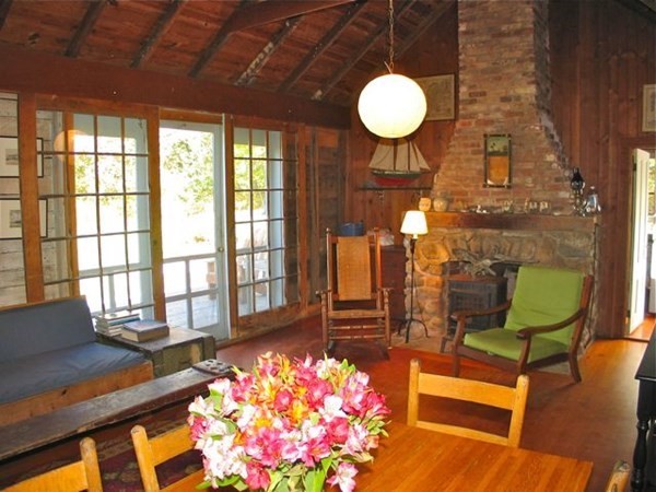 58 Forest Road West Tisbury, MA 02568 - Photo 3 of 29 a room with furniture and a chandelier