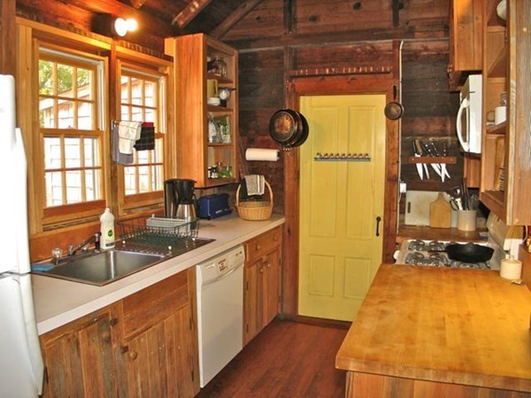 58 Forest Road West Tisbury, MA 02568 - Photo 6 of 29 a bathroom with a sink and a mirror