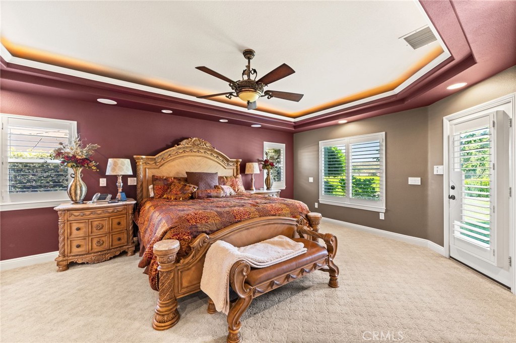 38136 Butterfly Court Yucaipa, CA 92399 - Photo 44 of 71 a bed room with a bed and window