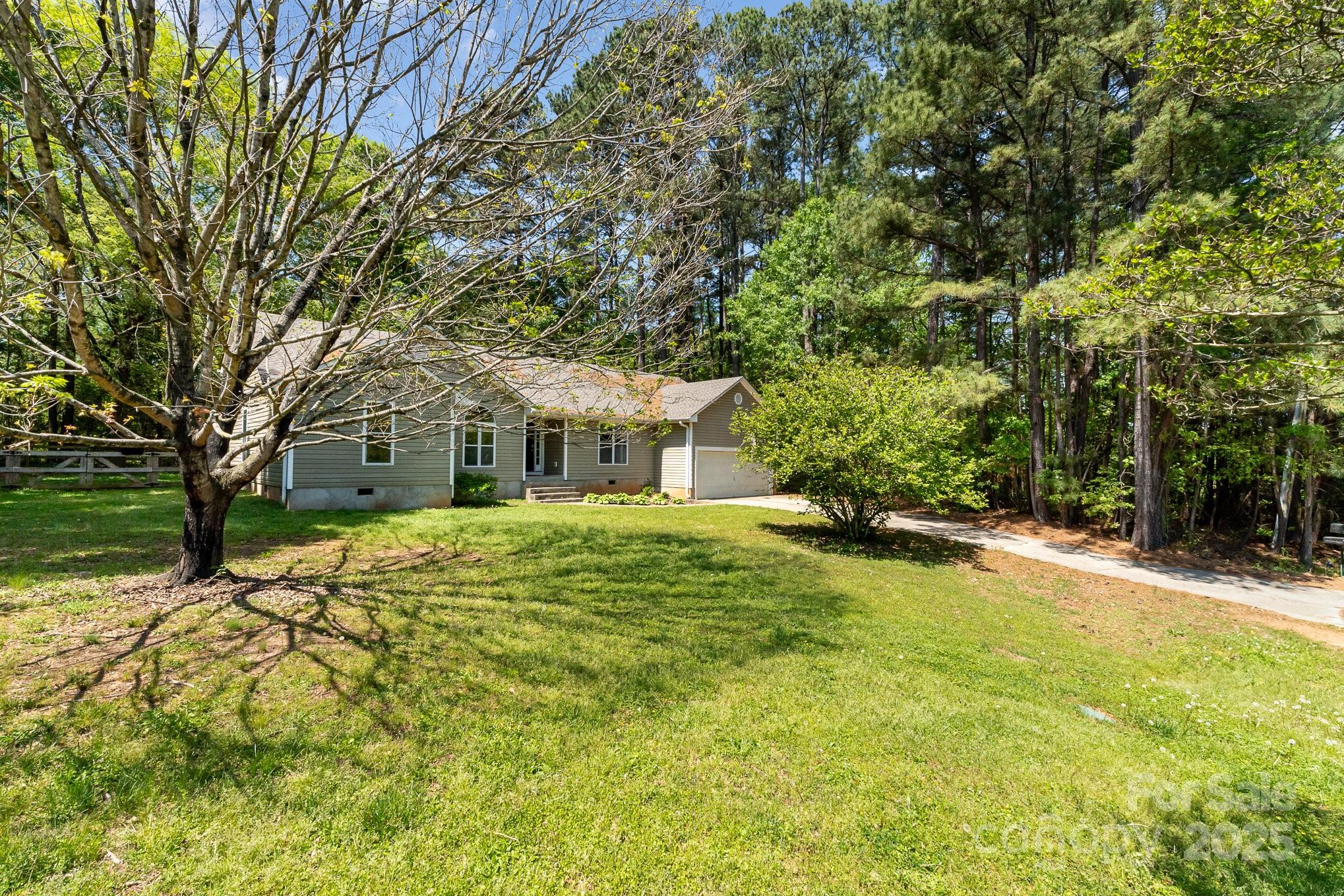 2014 Cardinal Loop Stanley, NC 28164 - Photo 2 of 40 a front view of a house with a yard