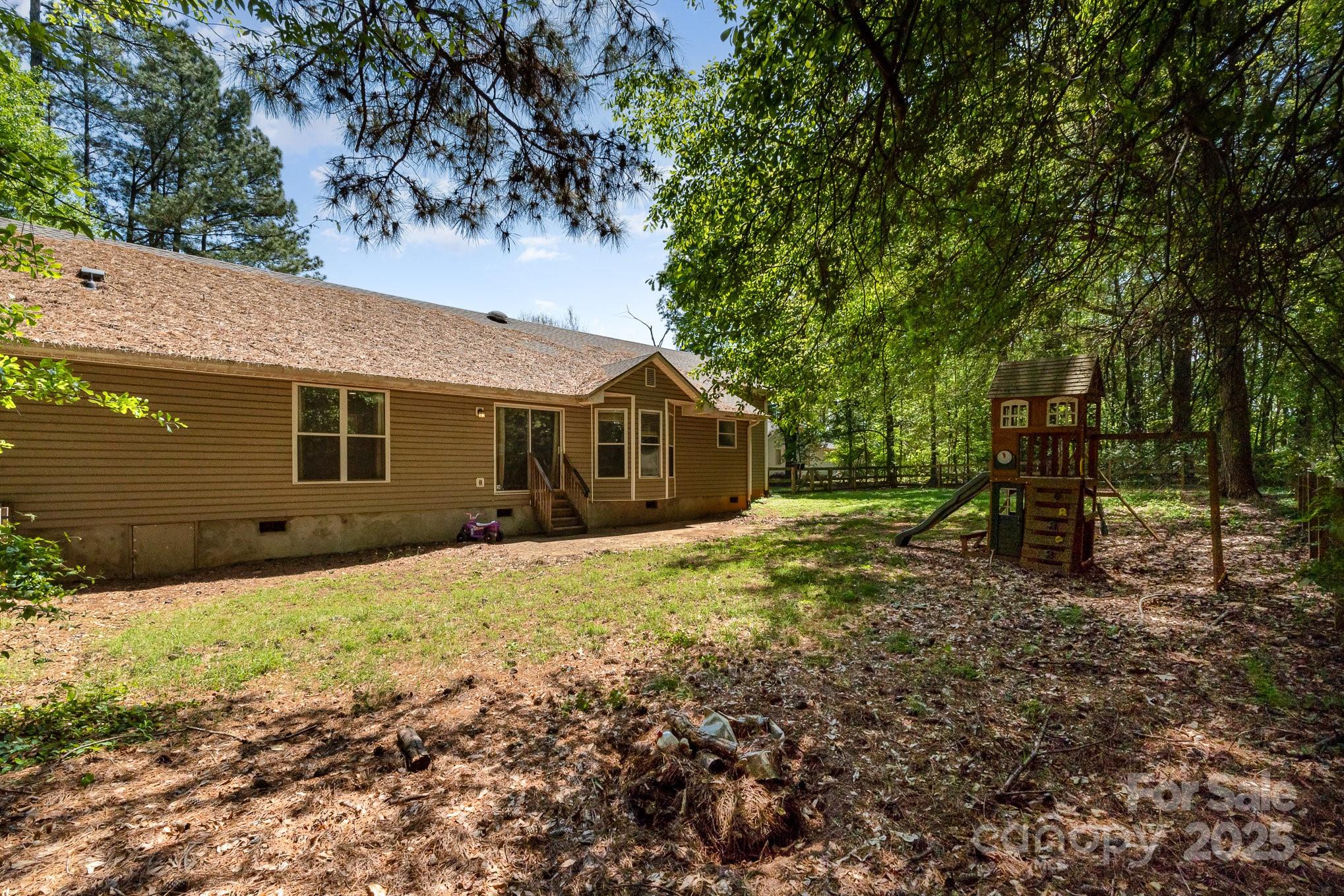 2014 Cardinal Loop Stanley, NC 28164 - Photo 34 of 40 a view of a house with a yard