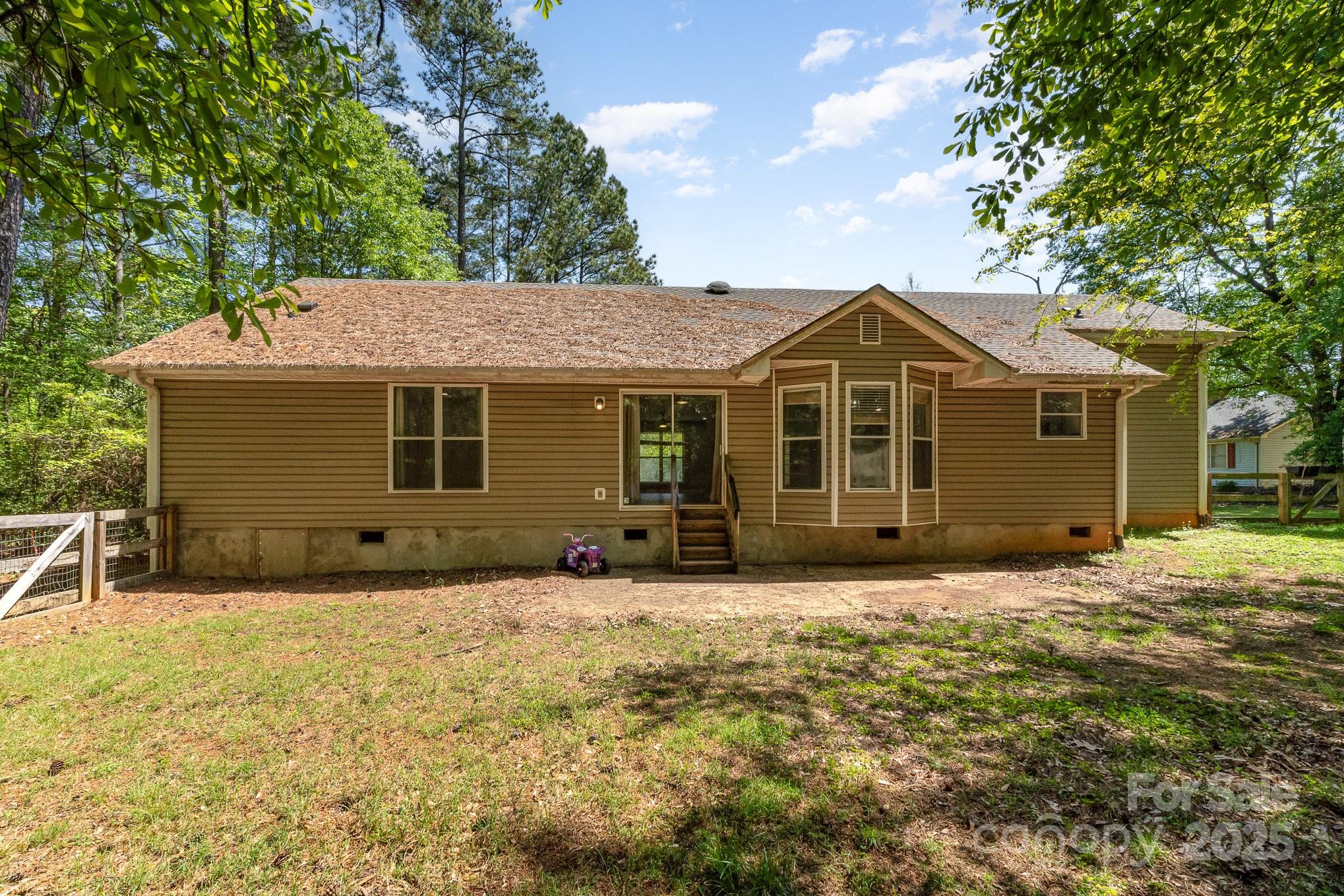 2014 Cardinal Loop Stanley, NC 28164 - Photo 36 of 40 a front view of a house with a garden