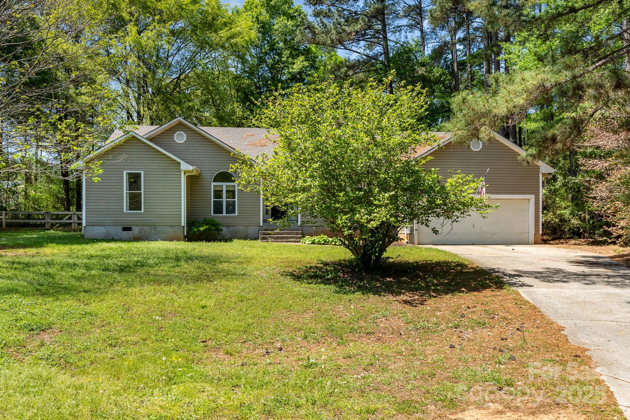 2014 Cardinal Loop Stanley, NC 28164 - Photo 5 of 40 a view of a house with a yard