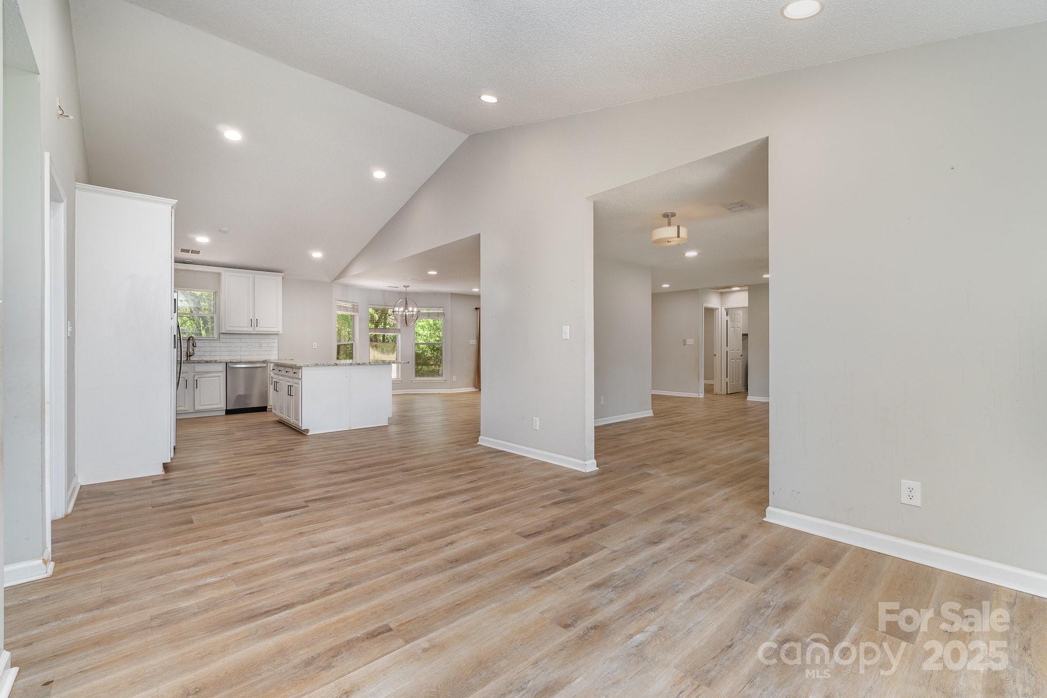 2014 Cardinal Loop Stanley, NC 28164 - Photo 10 of 40 a view of a kitchen and a living room