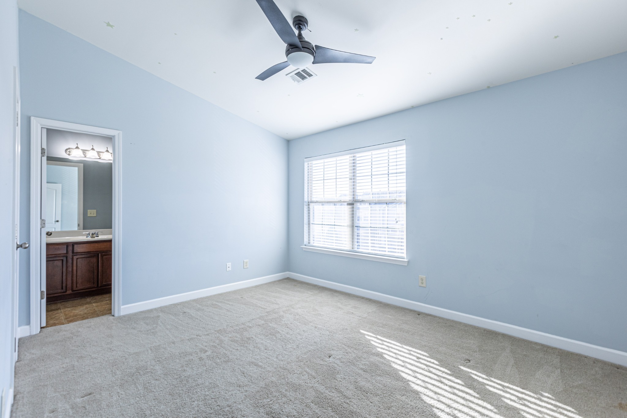 735 Tulip Grove Road, Unit 309 Hermitage, TN 37076 - Photo 14 of 18 a view of an empty room with a window