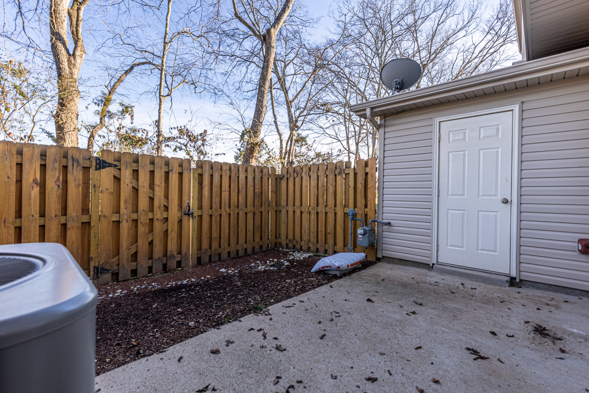 735 Tulip Grove Road, Unit 309 Hermitage, TN 37076 - Photo 17 of 18 a view of a backyard with pathway