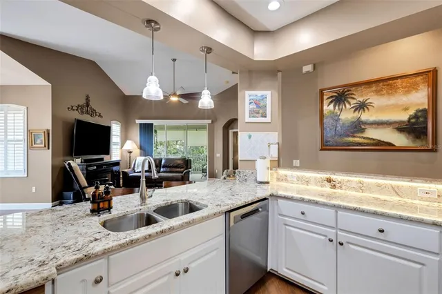 a kitchen with counter space cabinets and appliances