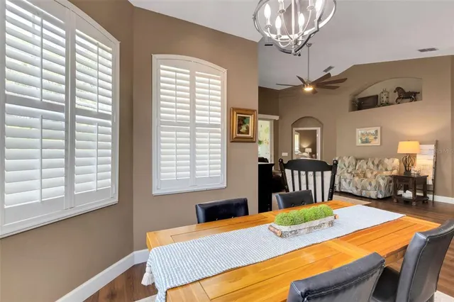 a bedroom with bed and a window