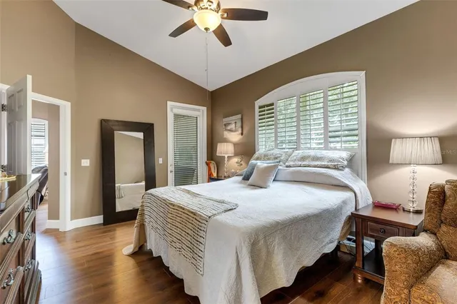 a room with a bed and a flat screen tv