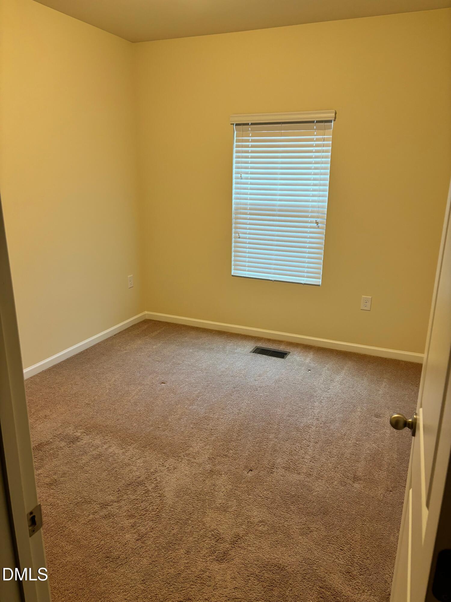 1005 Epiphany Road Morrisville, NC 27560 - Photo 14 of 21 a view of an empty room with a window