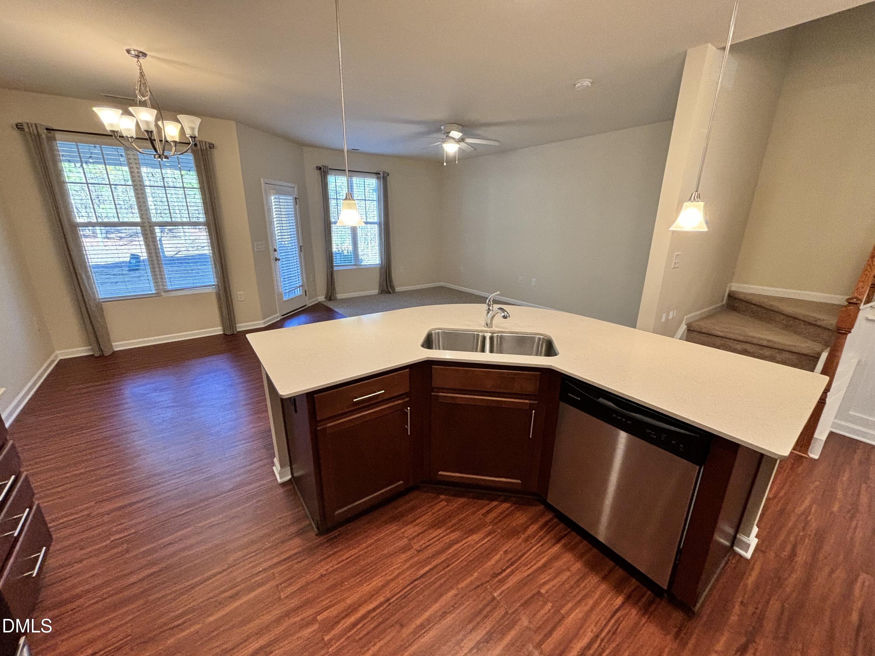 1005 Epiphany Road Morrisville, NC 27560 - Photo 6 of 21 a kitchen with wooden floors and sink
